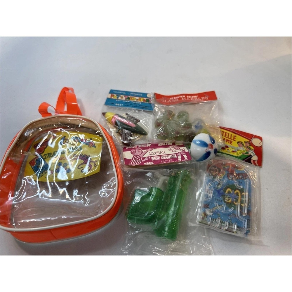 VTG Travel Toys Package Hong‎ Kong Puzzle Marbles Watergun Pinball Ring Backpack